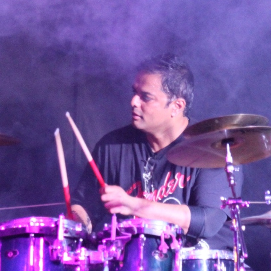 Benjamin Yates performing on drums